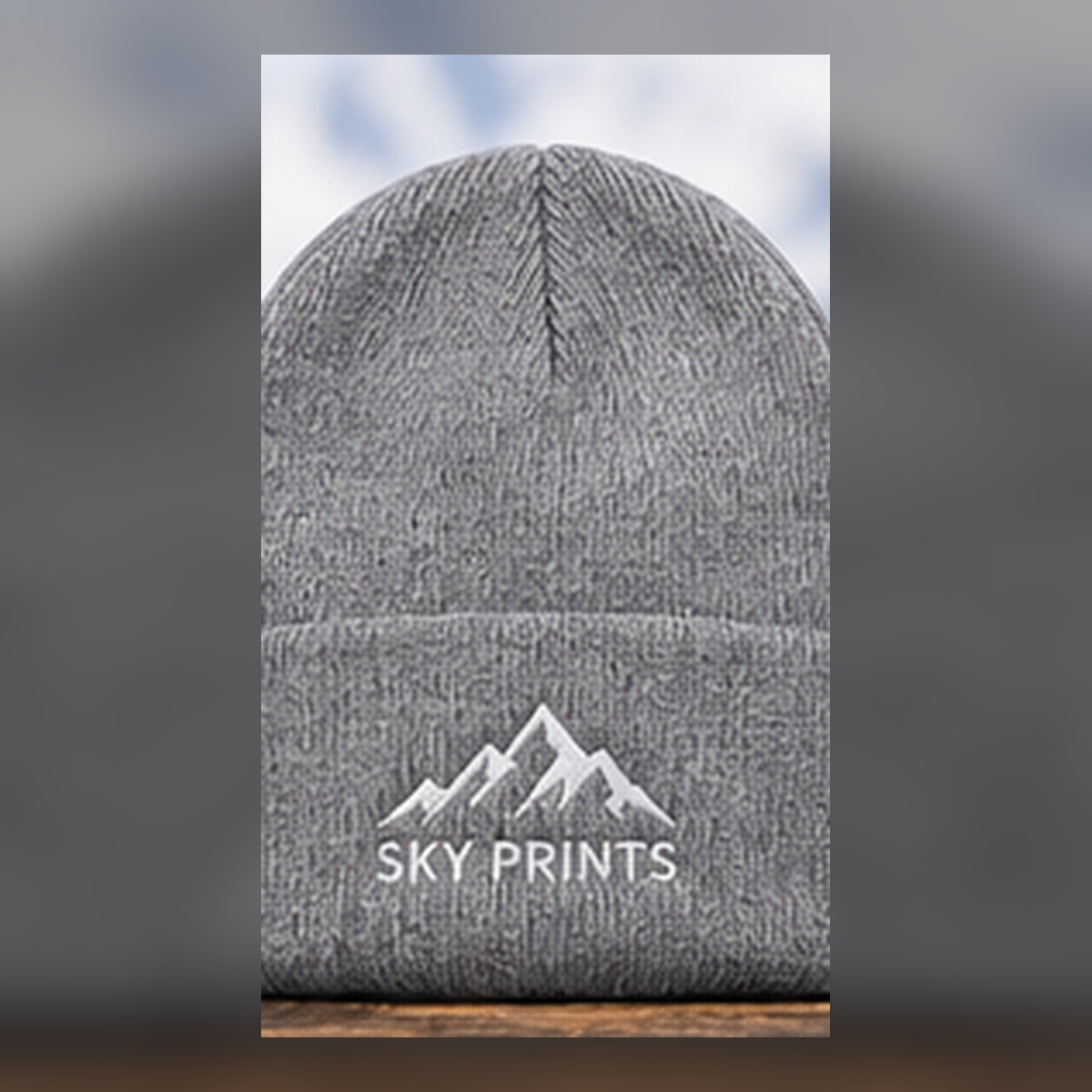 Sportsman SP08 heather grey custom embroidered beanie with Sky Prints logo