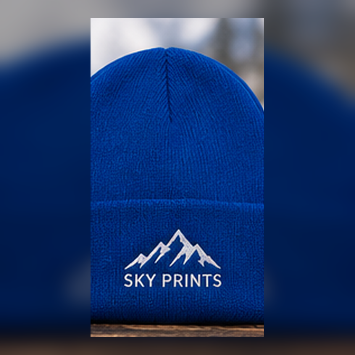 Sportsman SP08 royal blue custom embroidered beanie with Sky Prints logo